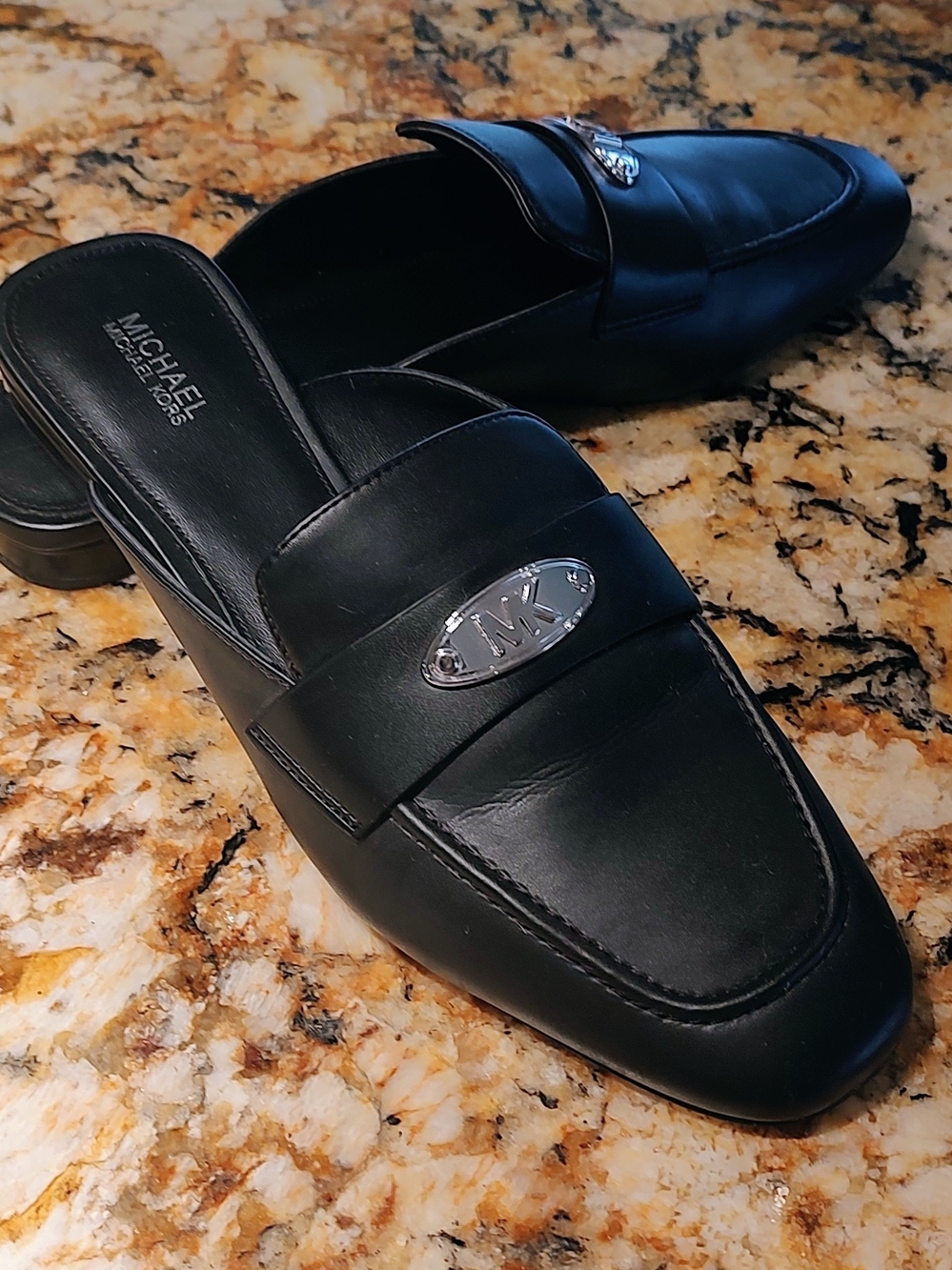 Michael Kors Black Leather Slip-On Mules with Silver MK Accent